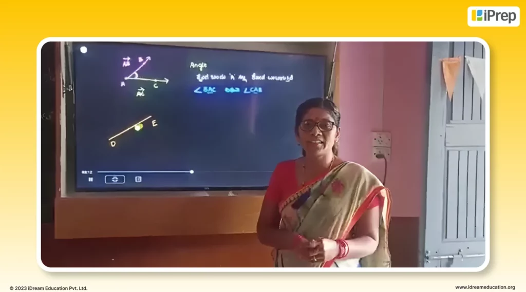 An image of teacher from a rural government school in Kembhavi Karnataka, appreciating our smart class solution, the iPrep Digital Class