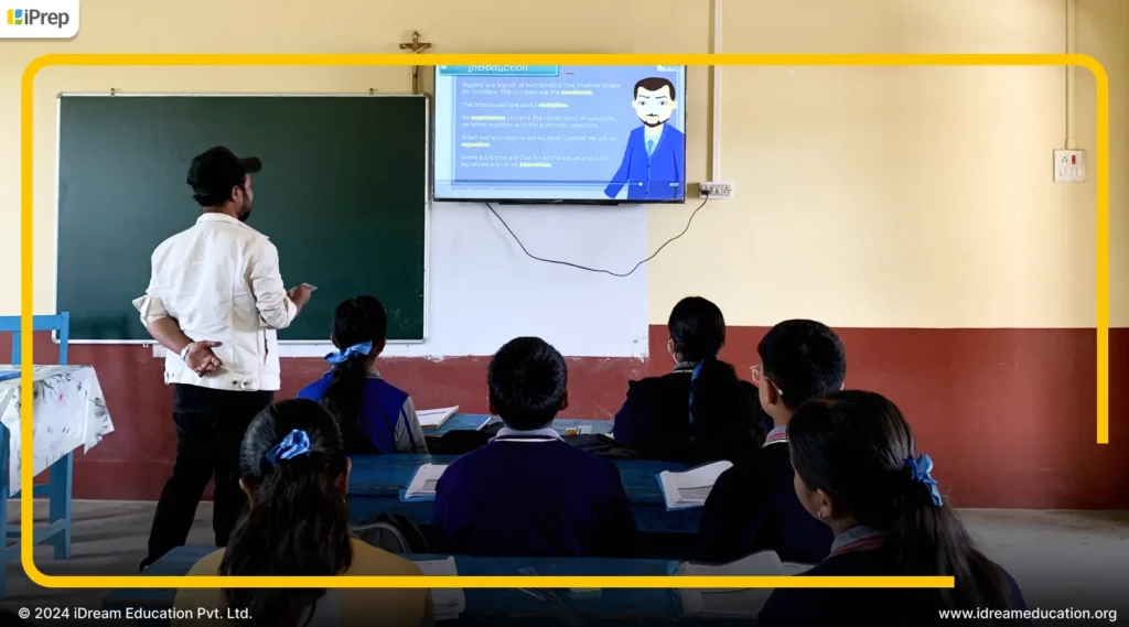 A Teacher in Meghalaya using a smart class setup iDream Education as part of a digital learning initiative, highlighting a glimpse of bookless education