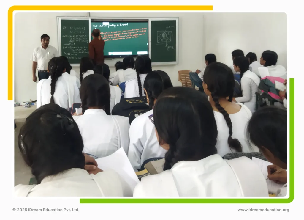 Smart classroom setup in a school in Noida, Uttar Pradesh, implemented by iDream Education, showcasing students engaged with digital learning tools in an interactive and technology-enabled environment