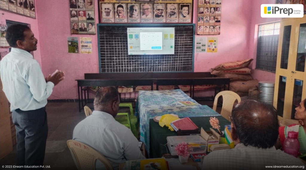 An image showing a teacher training for iPrep digital class, a smart class setup in a schools in Karnataka, Bangalore, organized by iDream Education.