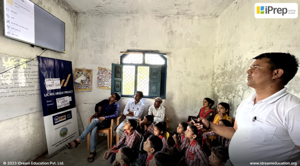 Image showing a group of teachers engaged in training sessions on utilizing smart classroom technology, conducted by iDream Education in schools across Uttarakhand