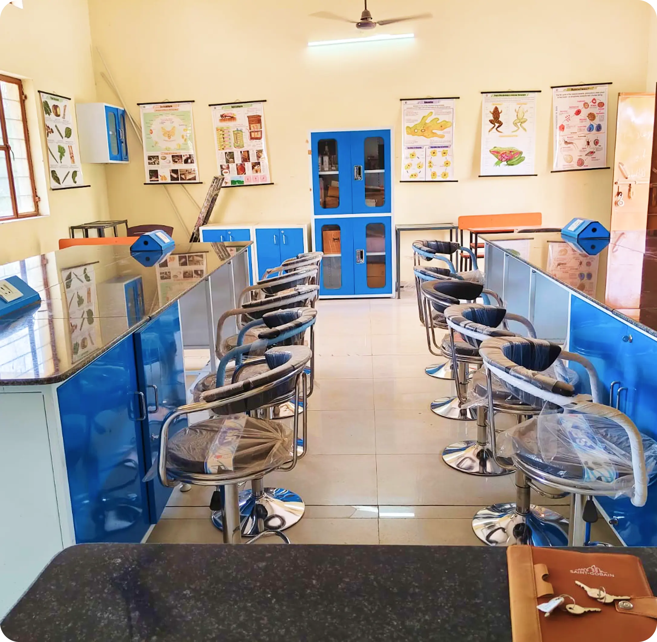 School science lab setup with laboratory equipment and learning materials arranged for student experiments and activities