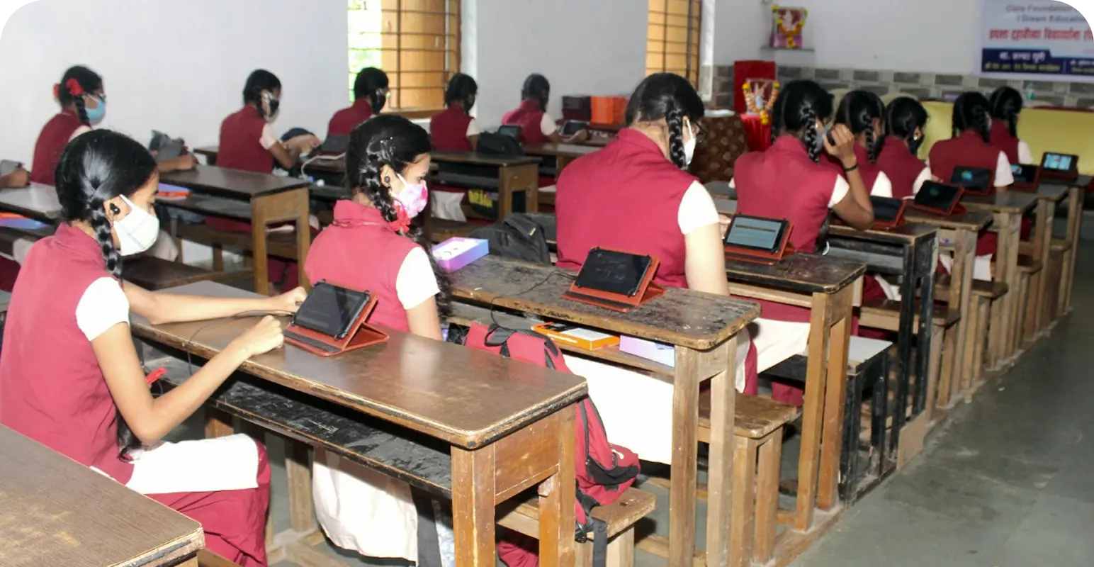Students engaged with digital learning material on their educational tablets in a school setting