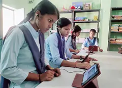 Students engaged in personalized learning through a Knowledge Digital Library set up by iDream Education