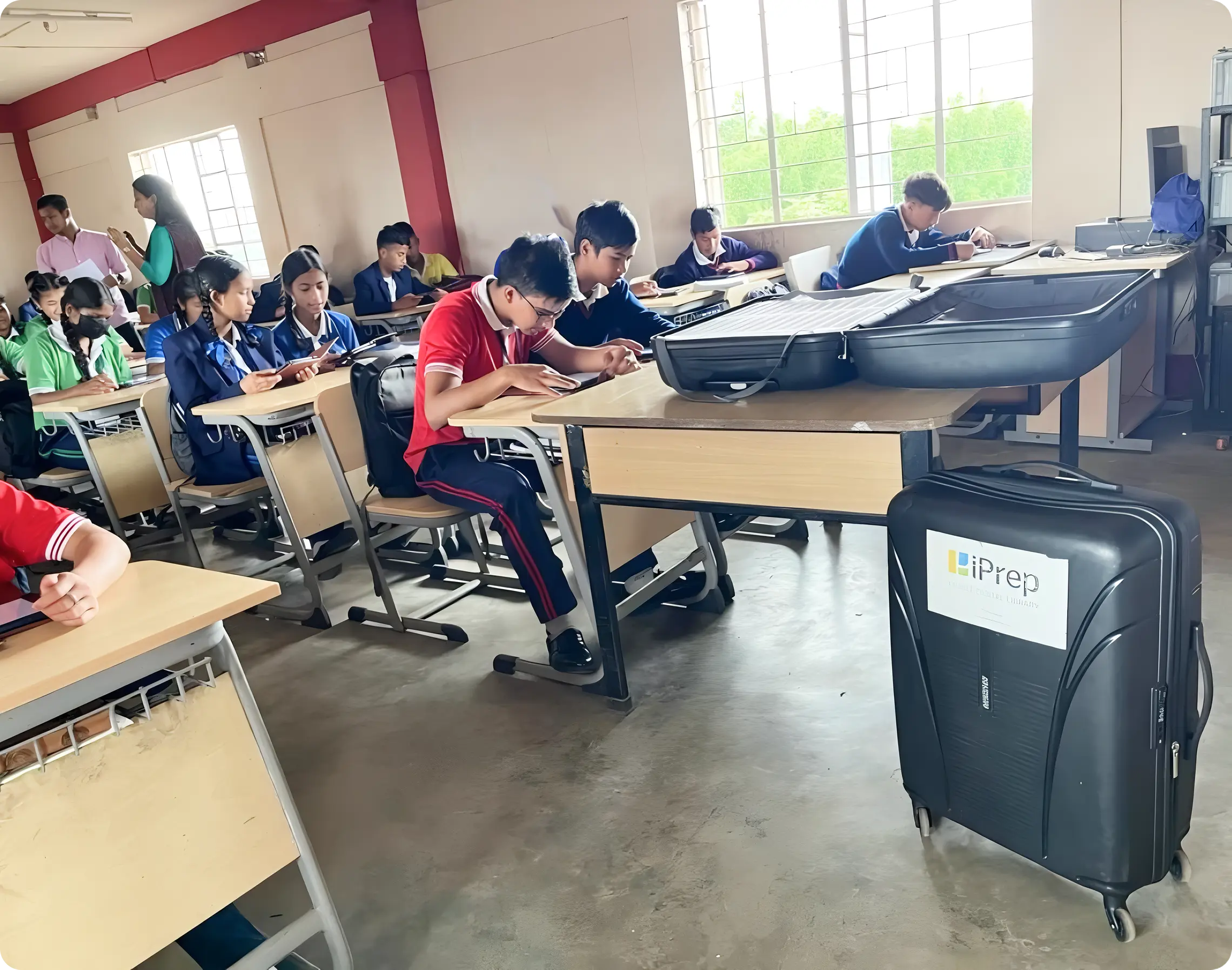 Image showing students taking tablet-based assessments and a mobile digital library setup designed for schools in remote hilly regions