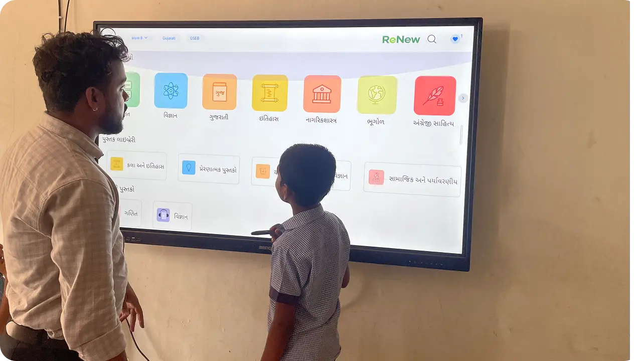 Teacher training session on using smart class in Gujarat school, implemented by education NGO for CSR initiative