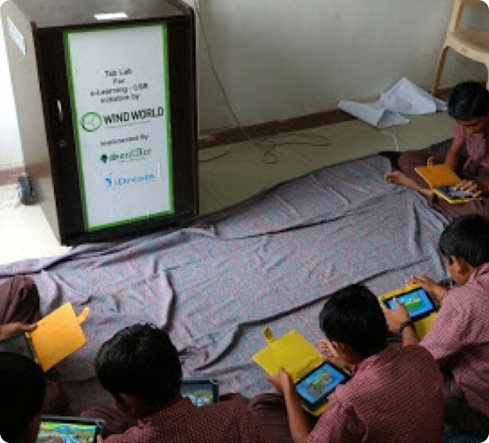 Students using tablets from an ICT lab in school by iDream Education