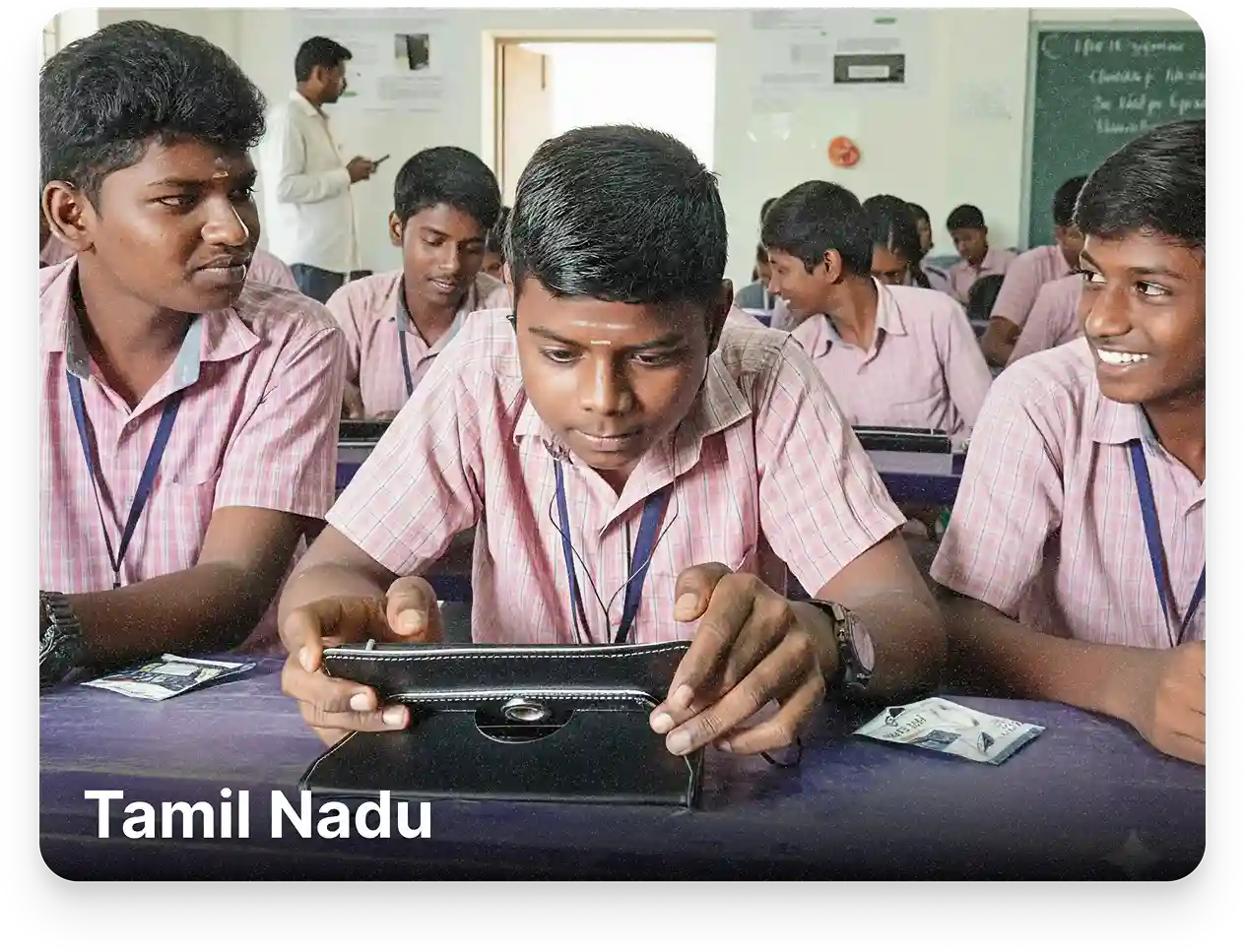 Student in a Tamil Nadu school using a tablet preloaded with Tamil Board-aligned digital learning content