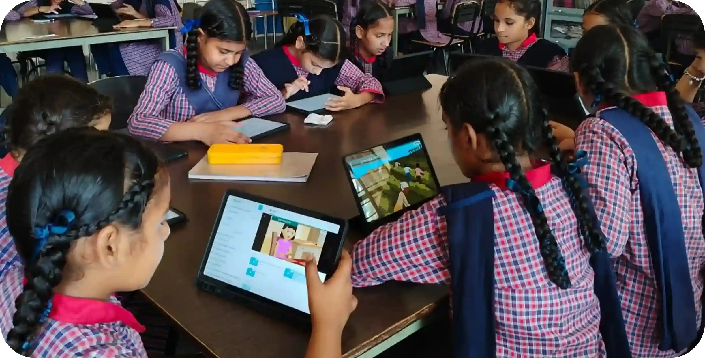 School students engaged in learning using PAL, an adaptive learning app, on individual learning devices designed for personalized learning 