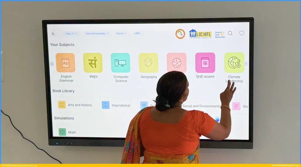 Teacher using a smart class content in a Uttarakhand school