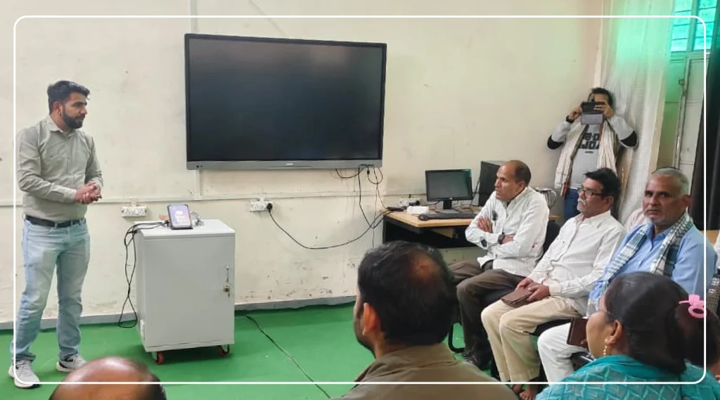 Teachers and the gram panchayat at the training session on tablet-based Digital Library implementation in Rajasthan Board government schools.