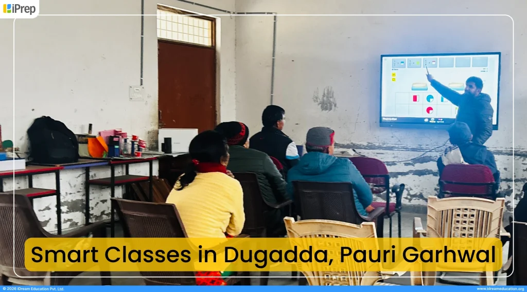 iDream Education team member providing smart class training on using smart classes in Dugadda government schools of Uttarakhand