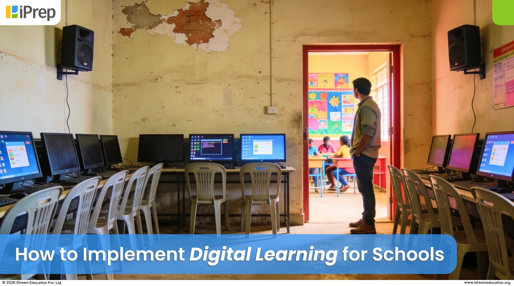 A teacher standing in an underused ICT computer lab in an Indian government school, highlighting the real challenges of digital learning implementation in schools.