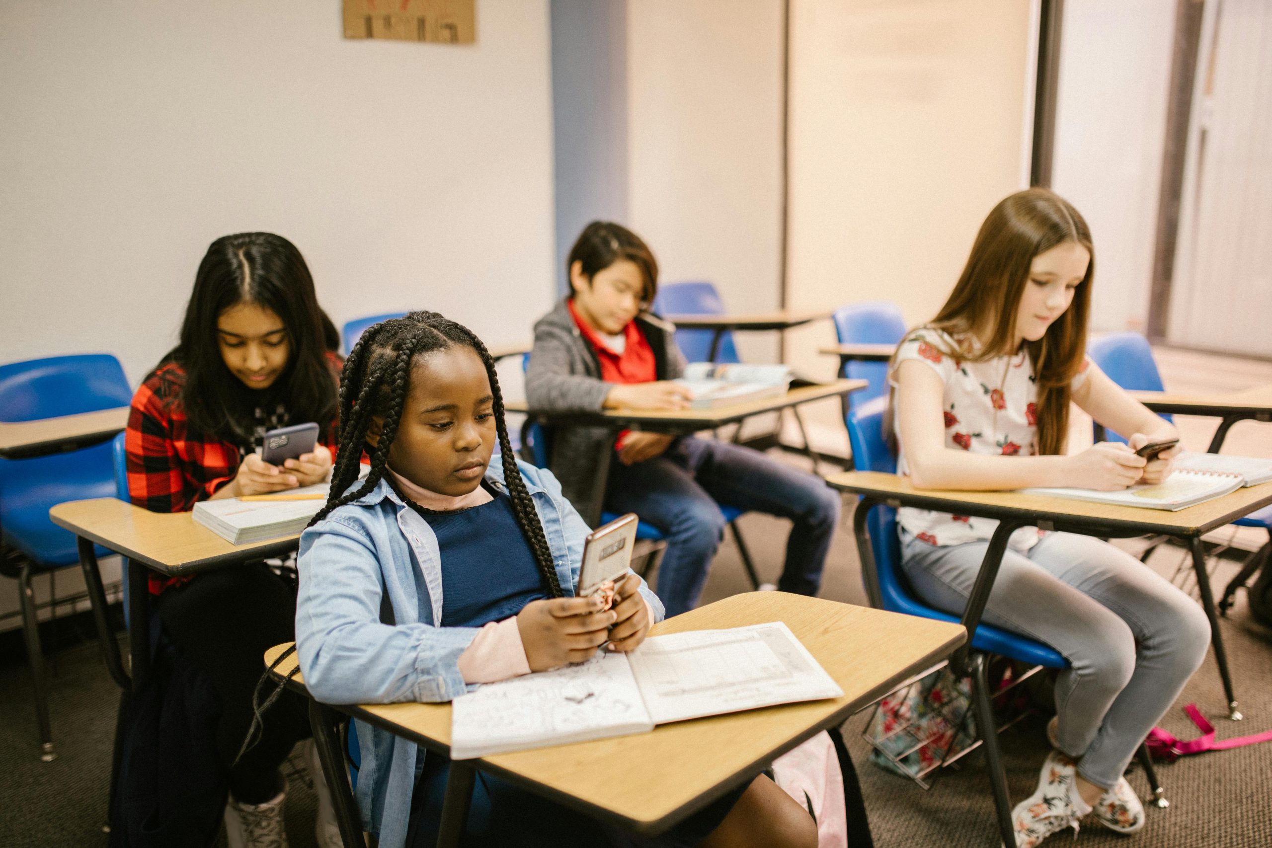 Adaptive learning in a multi-grade classroom in the Arab world Students in a multi-grade government school classroom each working on personalised learning paths using tablets