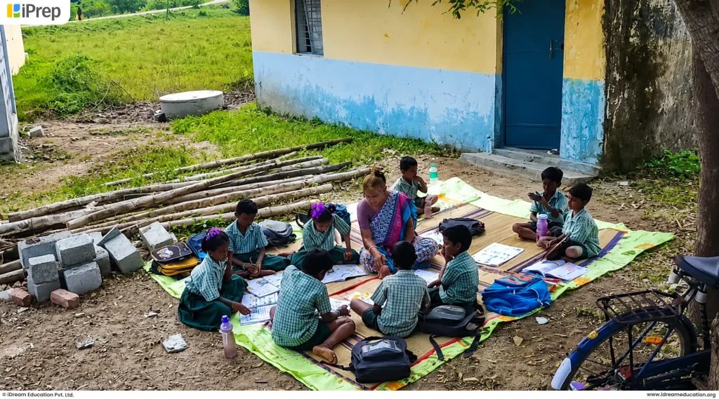 Students attending an outdoor classroom session at Nanjalur rural government schools