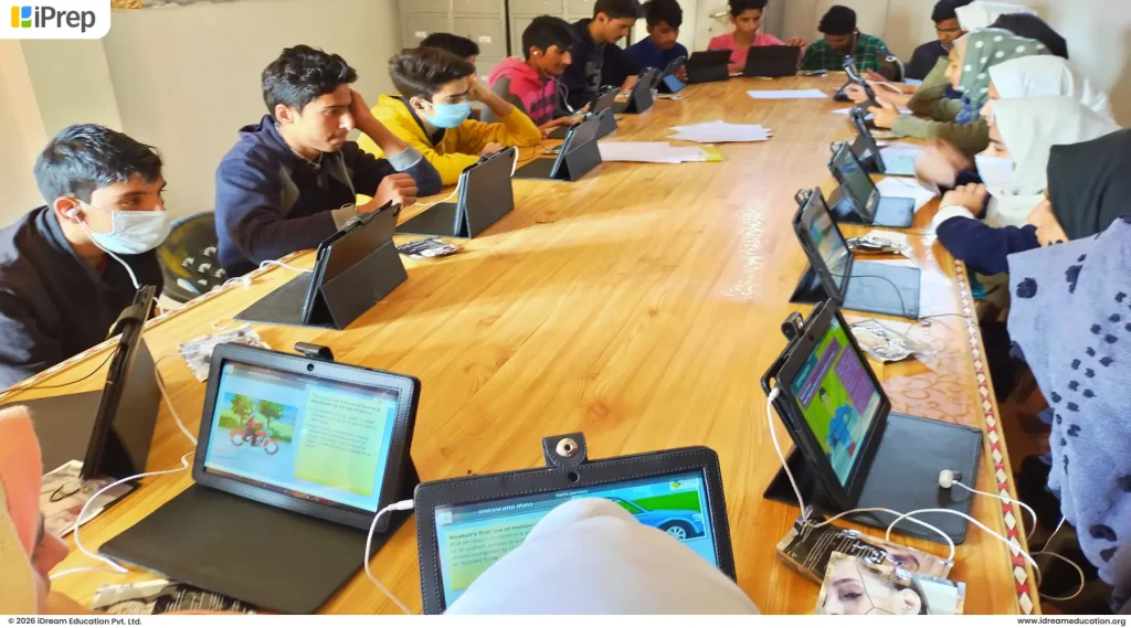 Students learning on tablets through a tablet-based digital library setup in Kashmir