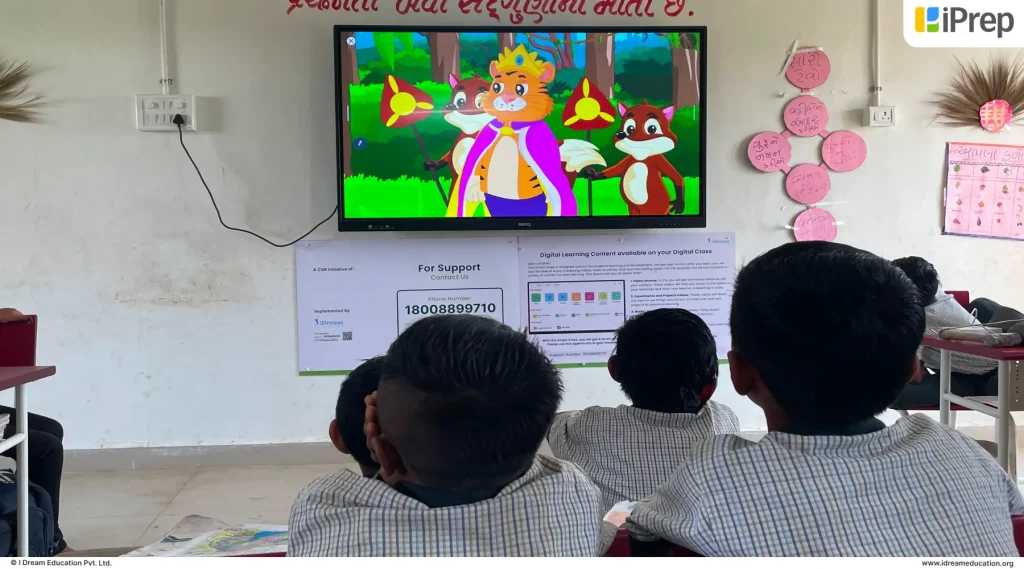 Interactive classroom session with Smart Class LMS digital content displayed on an interactive flat panel, encouraging student participation