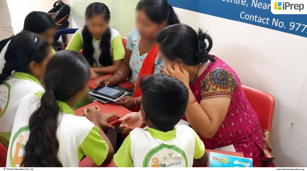 Students using PAL tablets from a digital library with PAL setup at a learning centre in Gurugram