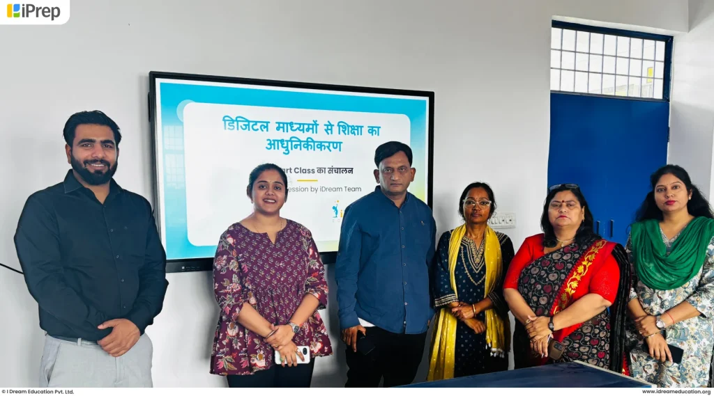 Teacher exploring iPrep smart class content in a government school classroom in Uttar Pradesh