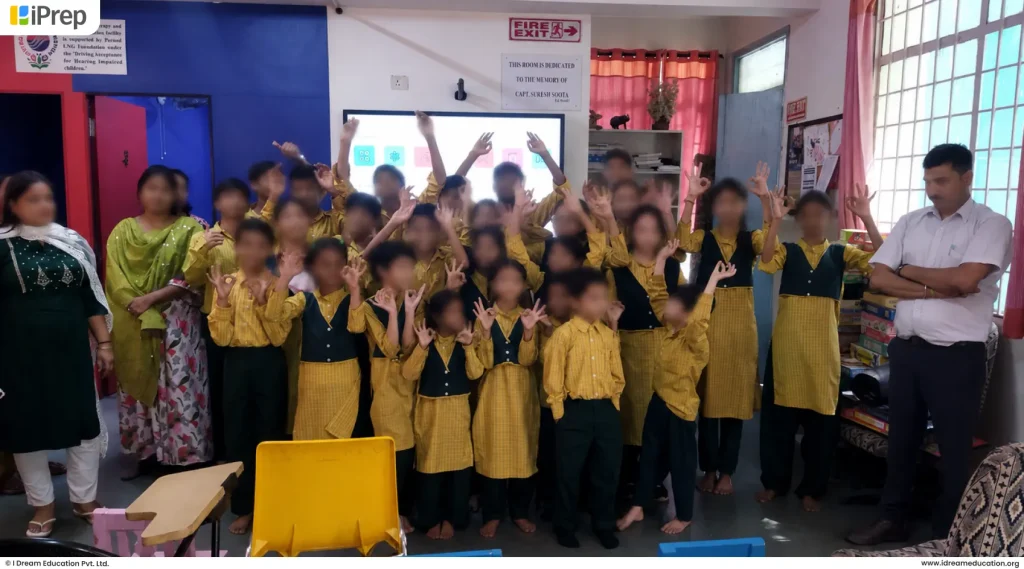 Students expressing joy after the smart class setup at their learning centre