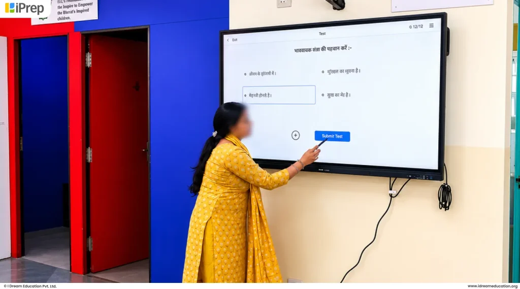Teacher exploring the practice section on a smart classroom platform during an experiential teacher training session