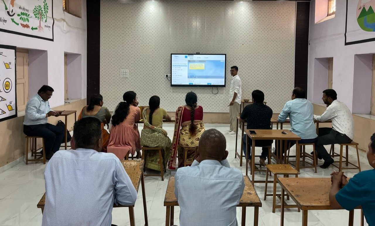 Teacher training session on Interactive Flat Panel in a government school classroom